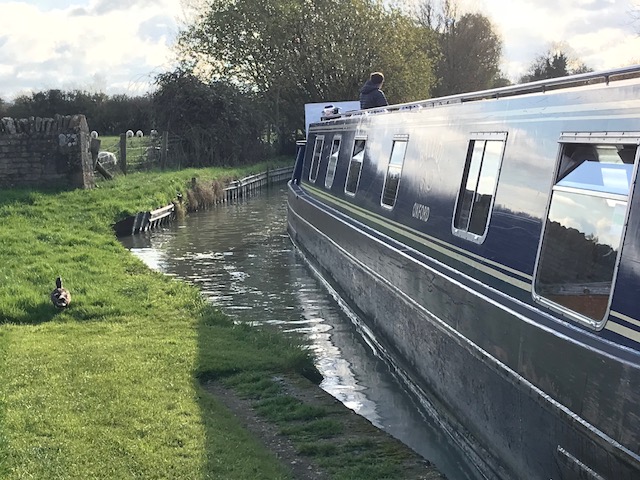 The Balliol narrowboat from College Cruisers coming alongside On Oxford Canal.